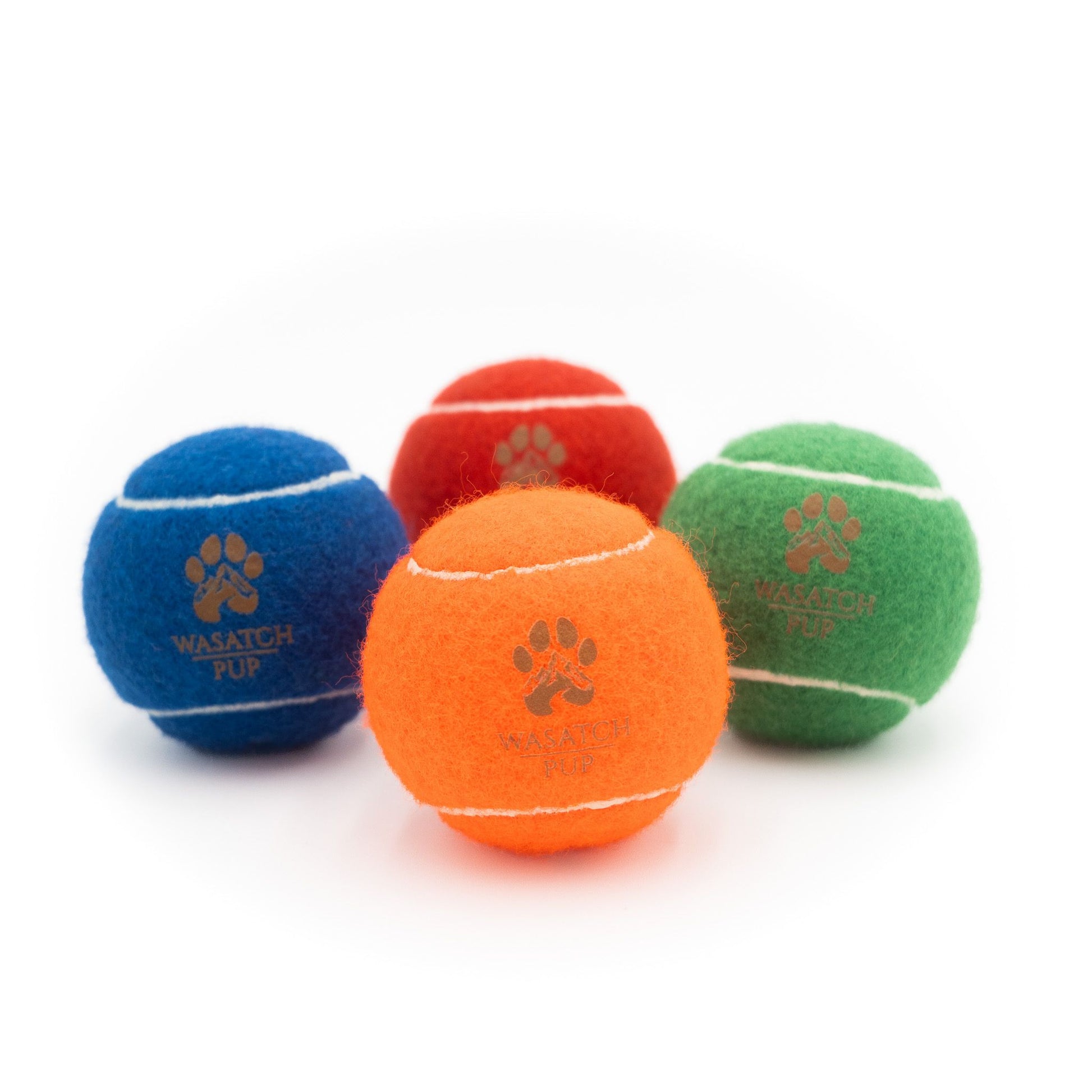 4 colors of tennis balls with wasatch pup logo in the center of the ball. Squeaky tennis balls